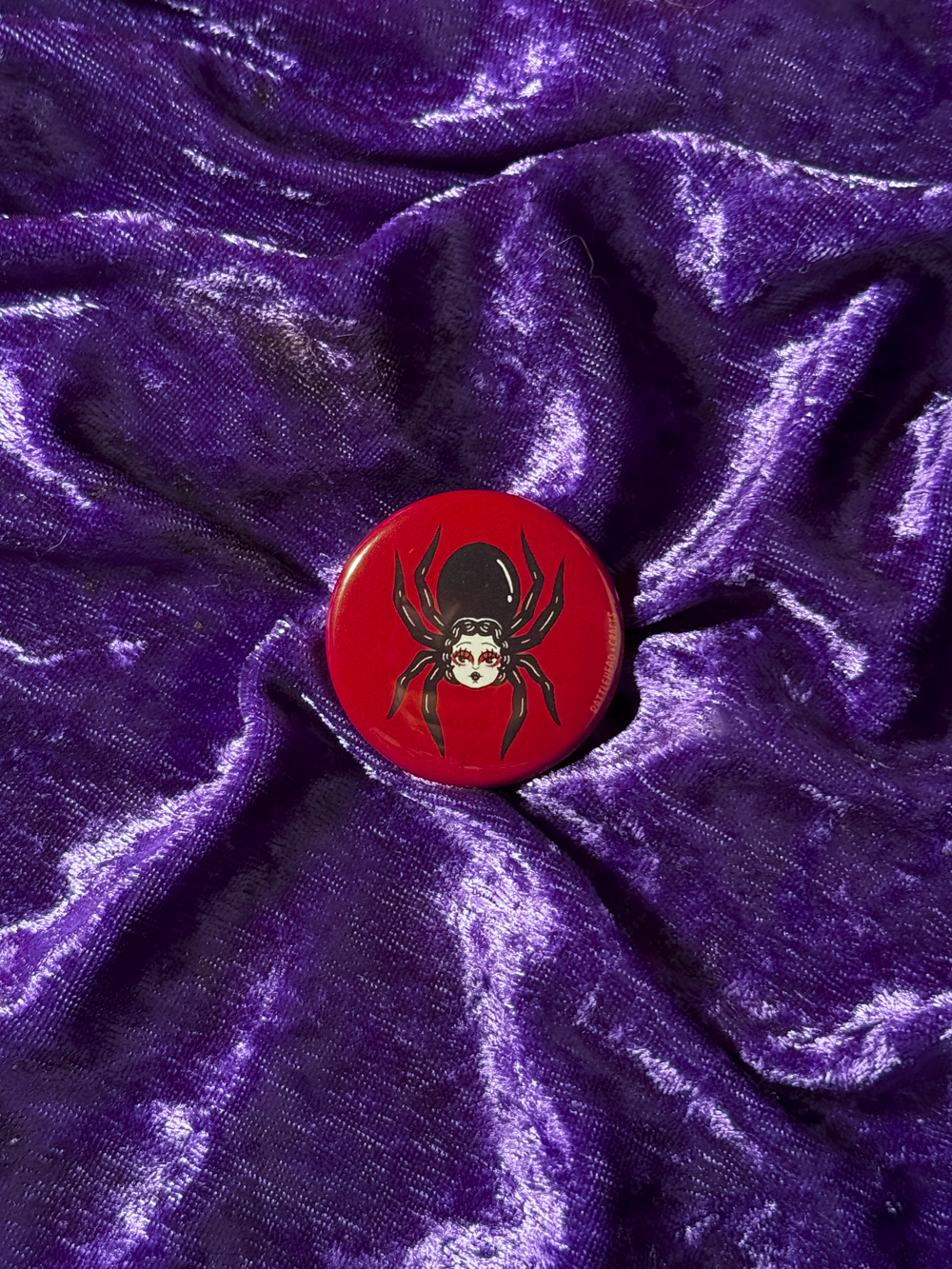 Webspinner Button